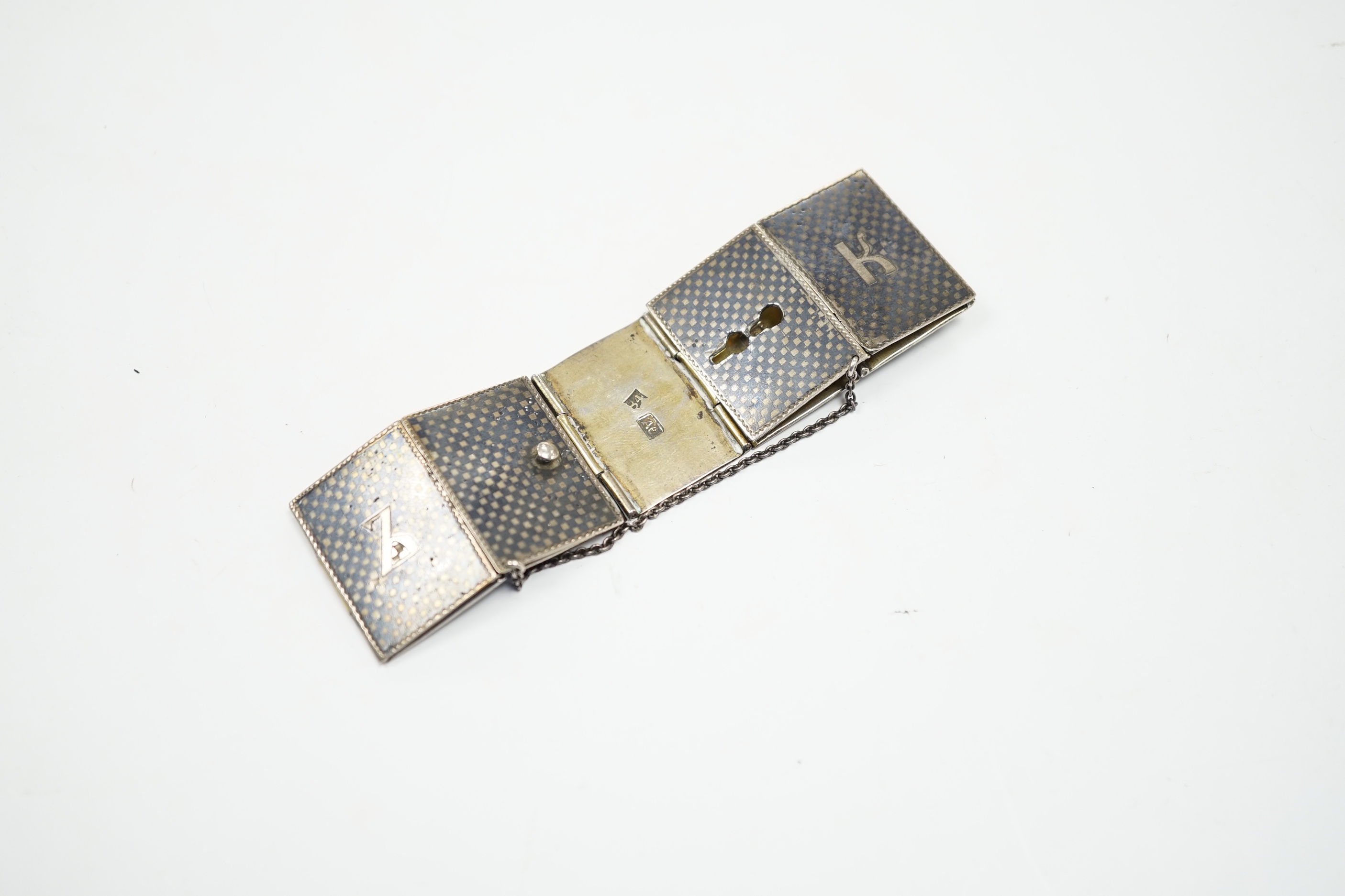 A late 19th/early 20th century Russian 84 zolotnik and niello bracelet, with Cyrillic script.
